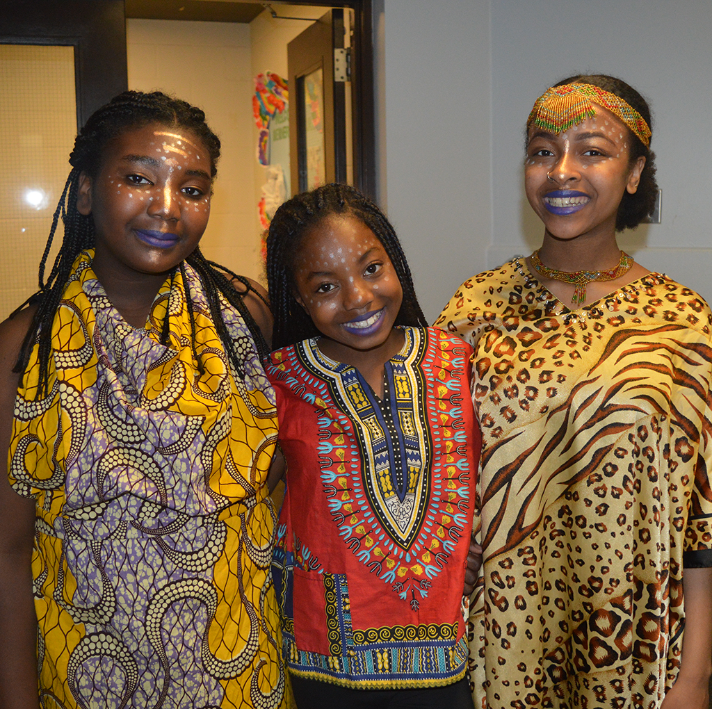 Roots & Branches Image - 3 Dancers Stand Togeather In Costume
