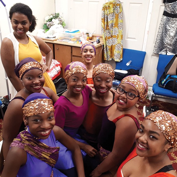Roots & Branches Image - Dancers Pose Back Stage Before A Proformance
